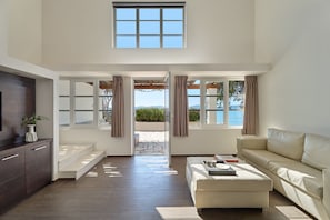 Two-Storey Beachfront Residence | Living area | 37-inch flat-screen TV with satellite channels, TV - Hydra Beach Resort  (Ermionida)
