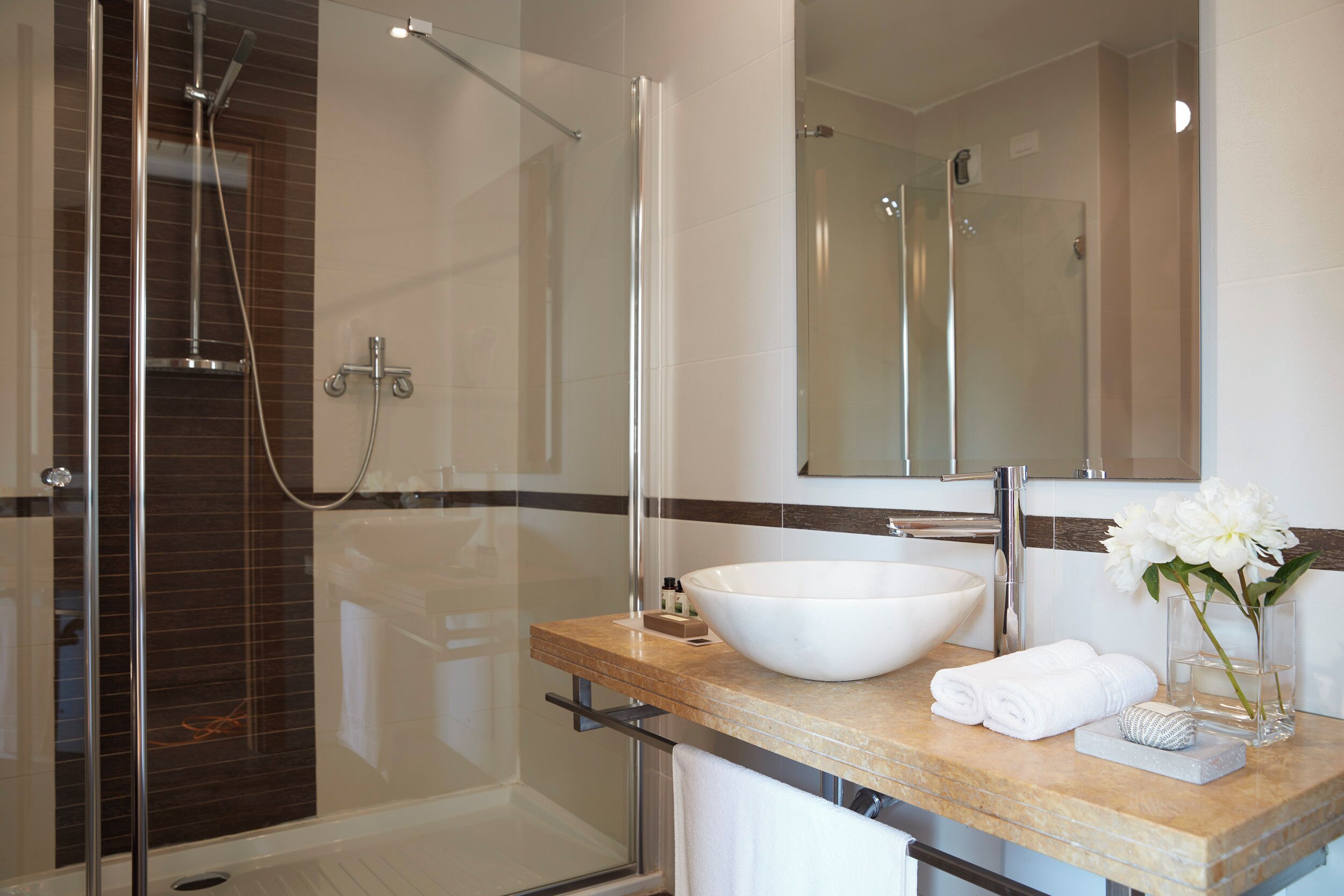 rainfall showerhead, eco-friendly toiletries, hair dryer, bidet