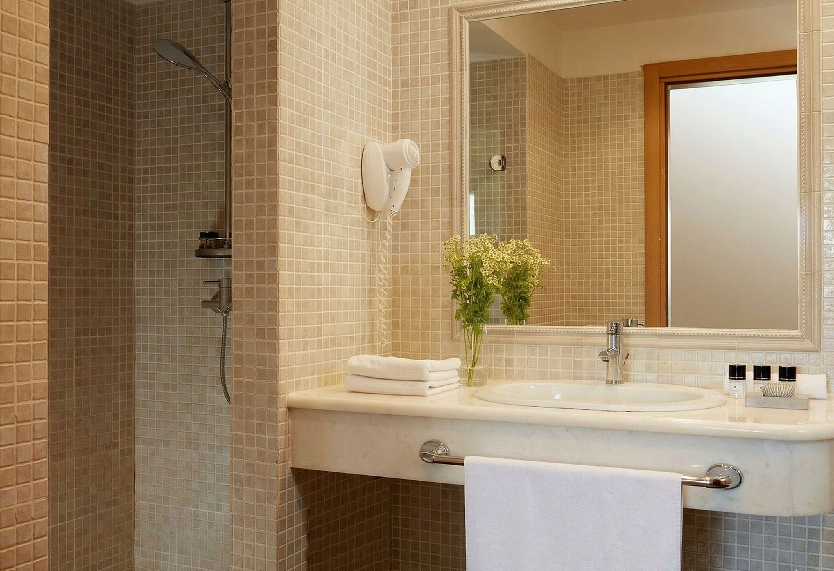 Rainfall showerhead, eco-friendly toiletries, hair dryer, slippers