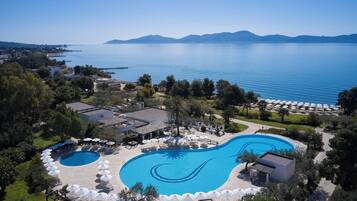 Indoor pool, outdoor pool, open 10:00 AM to 6:00 PM, pool umbrellas