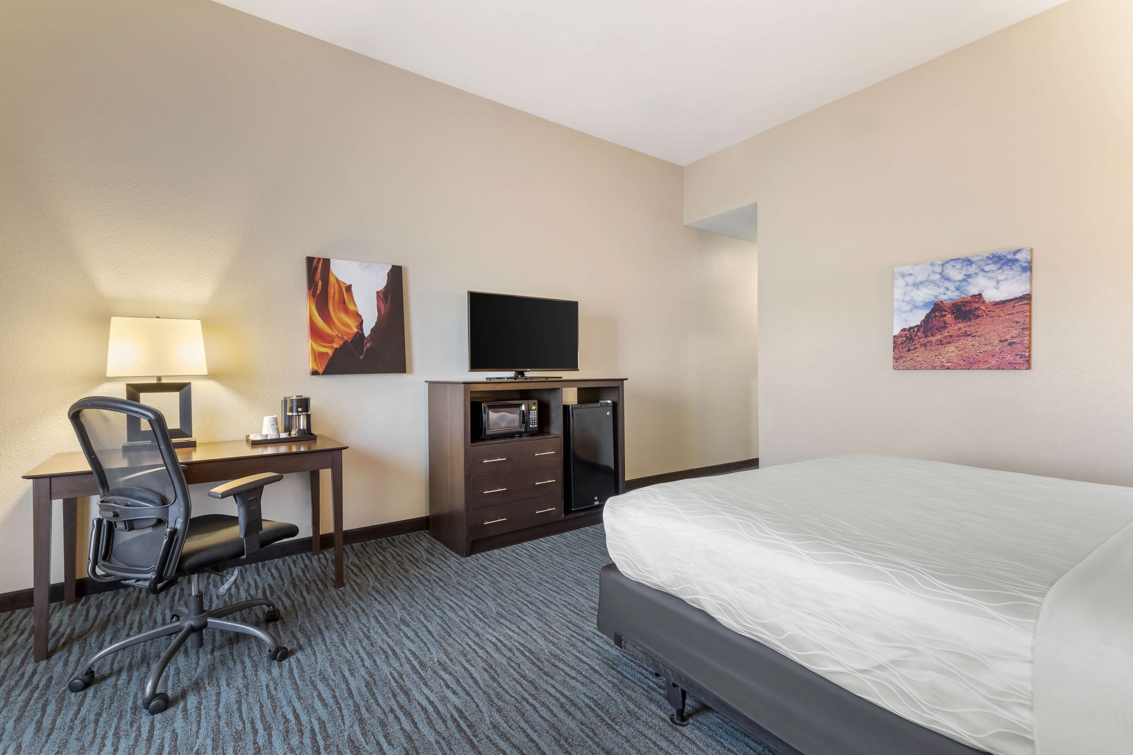 premium bedding, desk, laptop workspace, blackout curtains