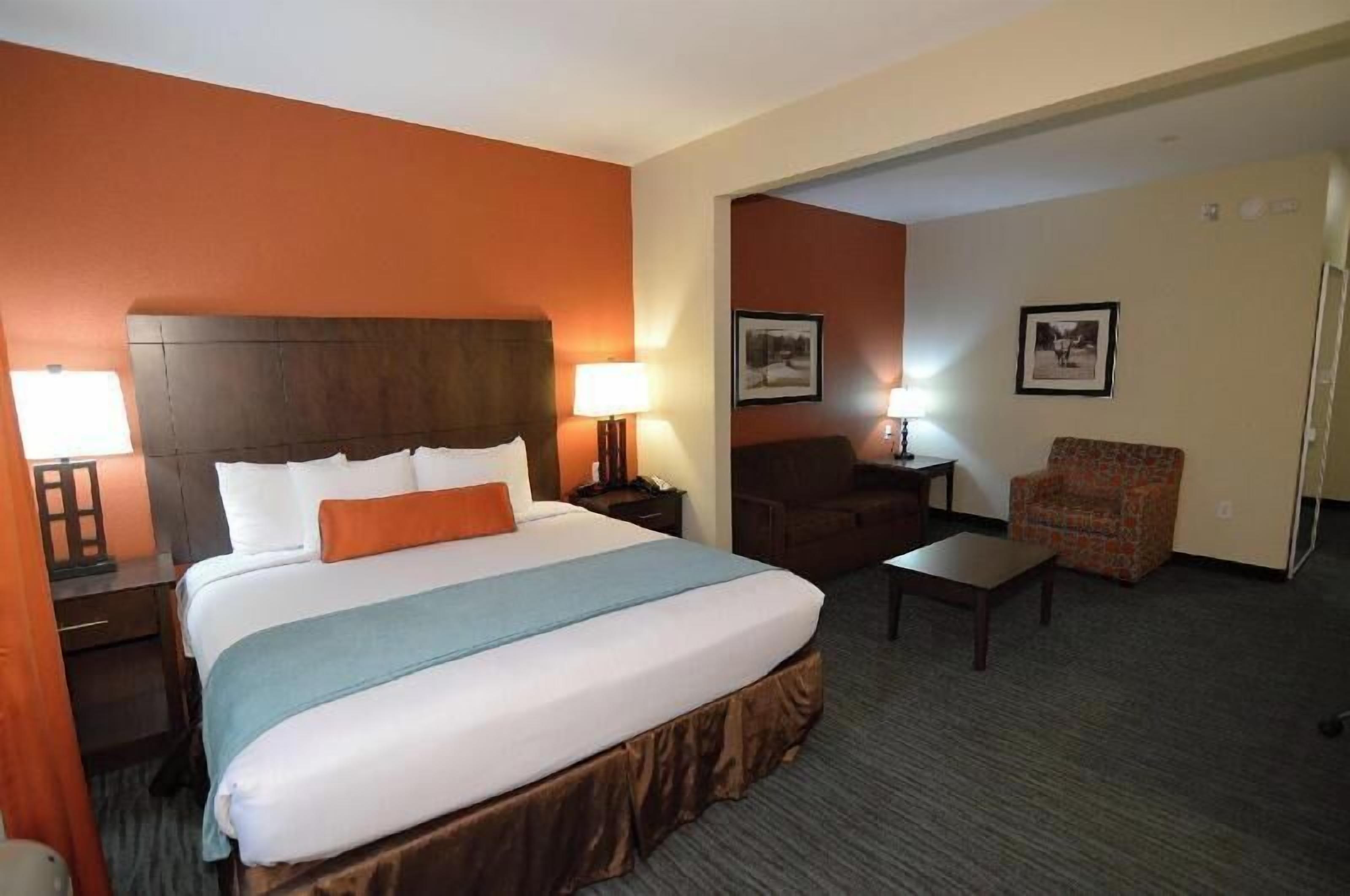 Premium bedding, desk, laptop workspace, blackout curtains
