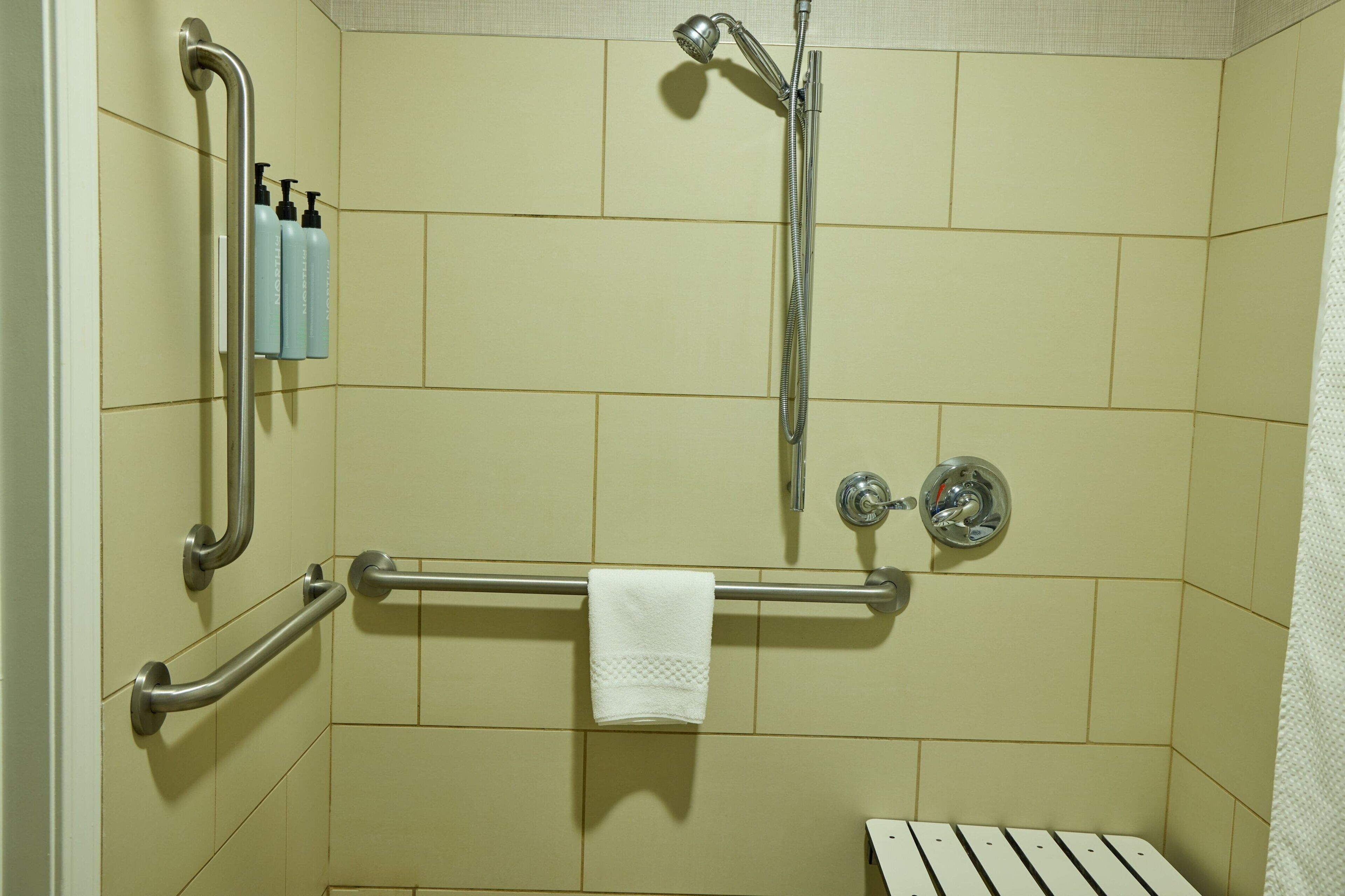 combined shower/bathtub, free toiletries, hair dryer, towels
