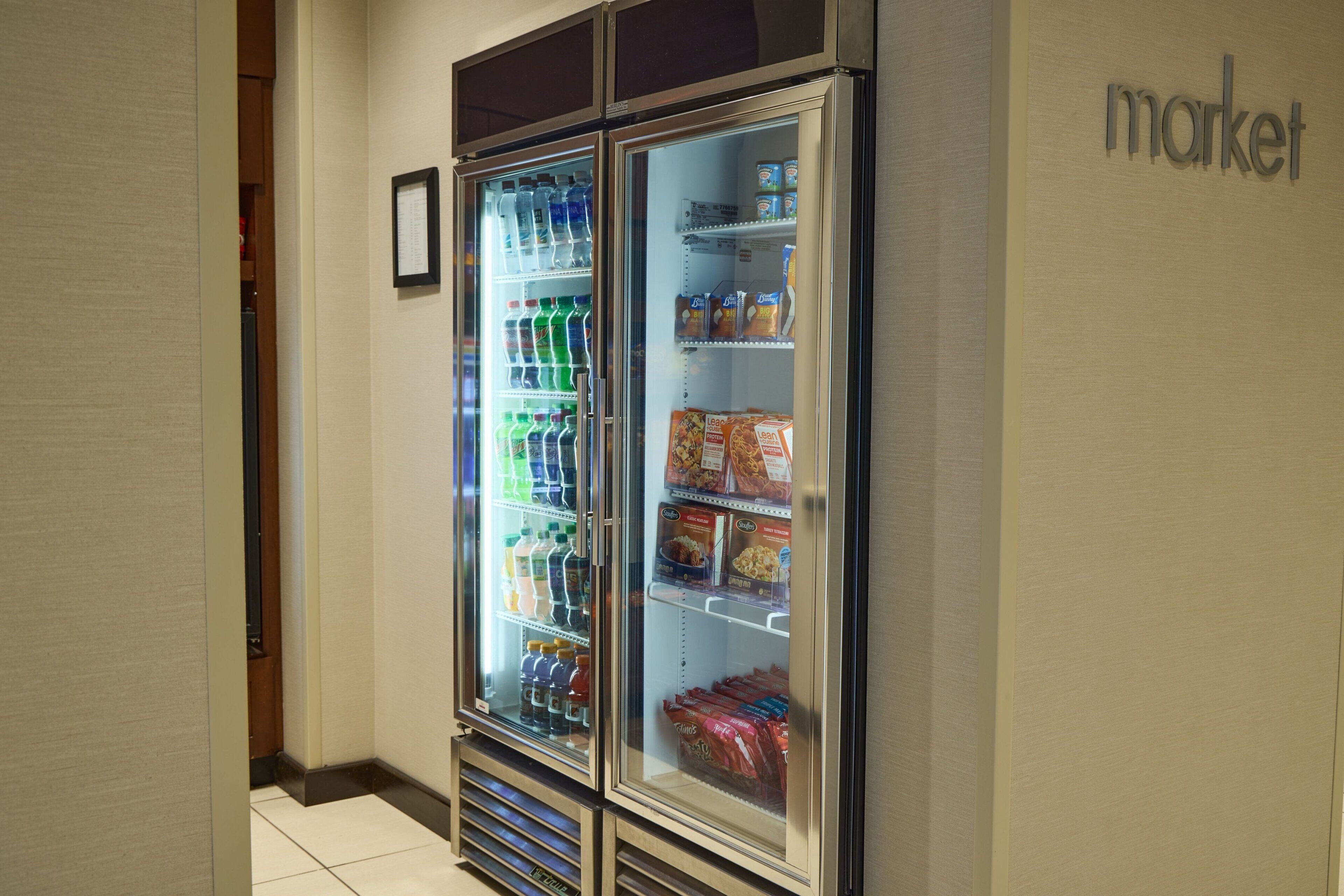 A vending machine with various beverages and snacks.