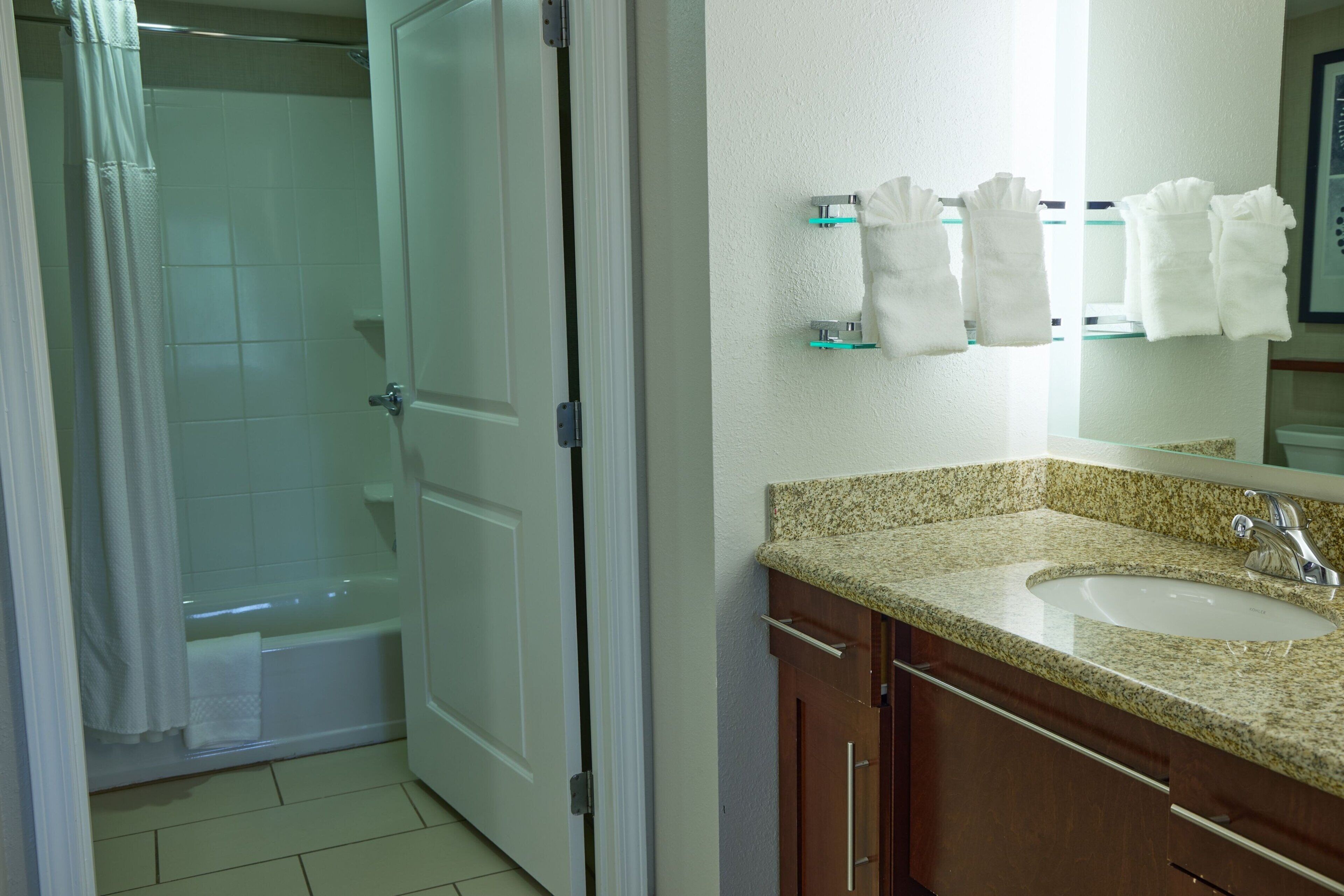 combined shower/bathtub, free toiletries, hair dryer, towels