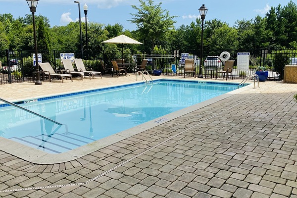 Outdoor pool, open 8:00 AM to 10:00 PM, pool umbrellas