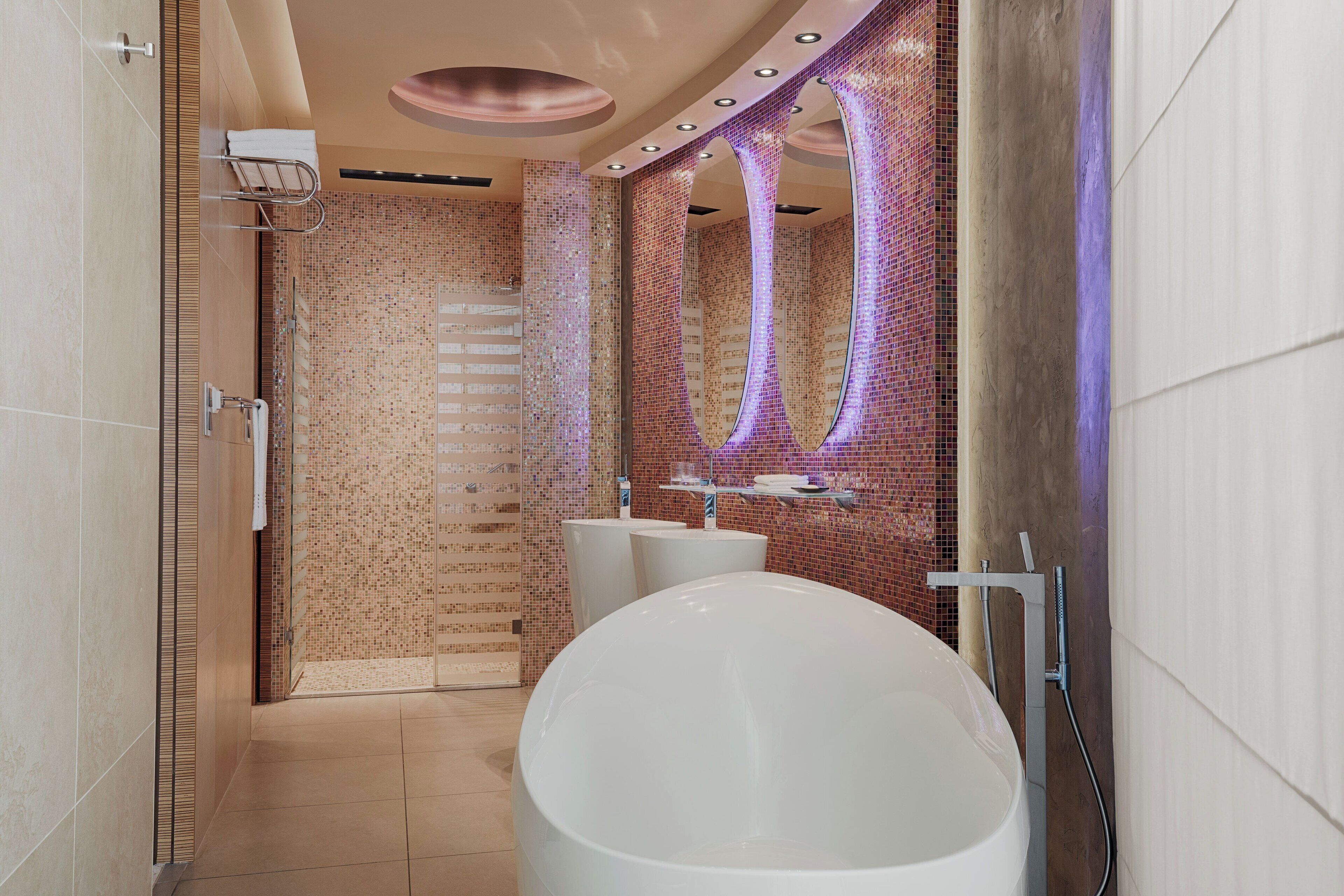 penthouse, 1 king bed | bathroom | hair dryer, bathrobes, towels, soap