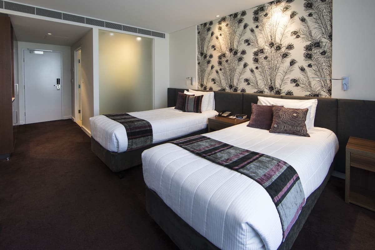 deluxe twin | 1 bedroom, premium bedding, in-room safe, desk