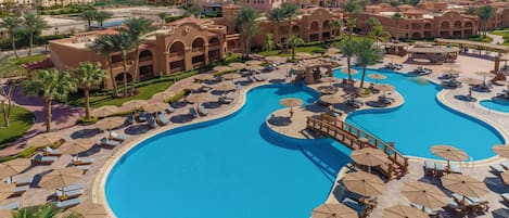 Outdoor pool, pool umbrellas, sun loungers