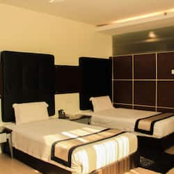 Deluxe Double or Twin Room | 1 bedroom, minibar, blackout drapes, iron/ironing board