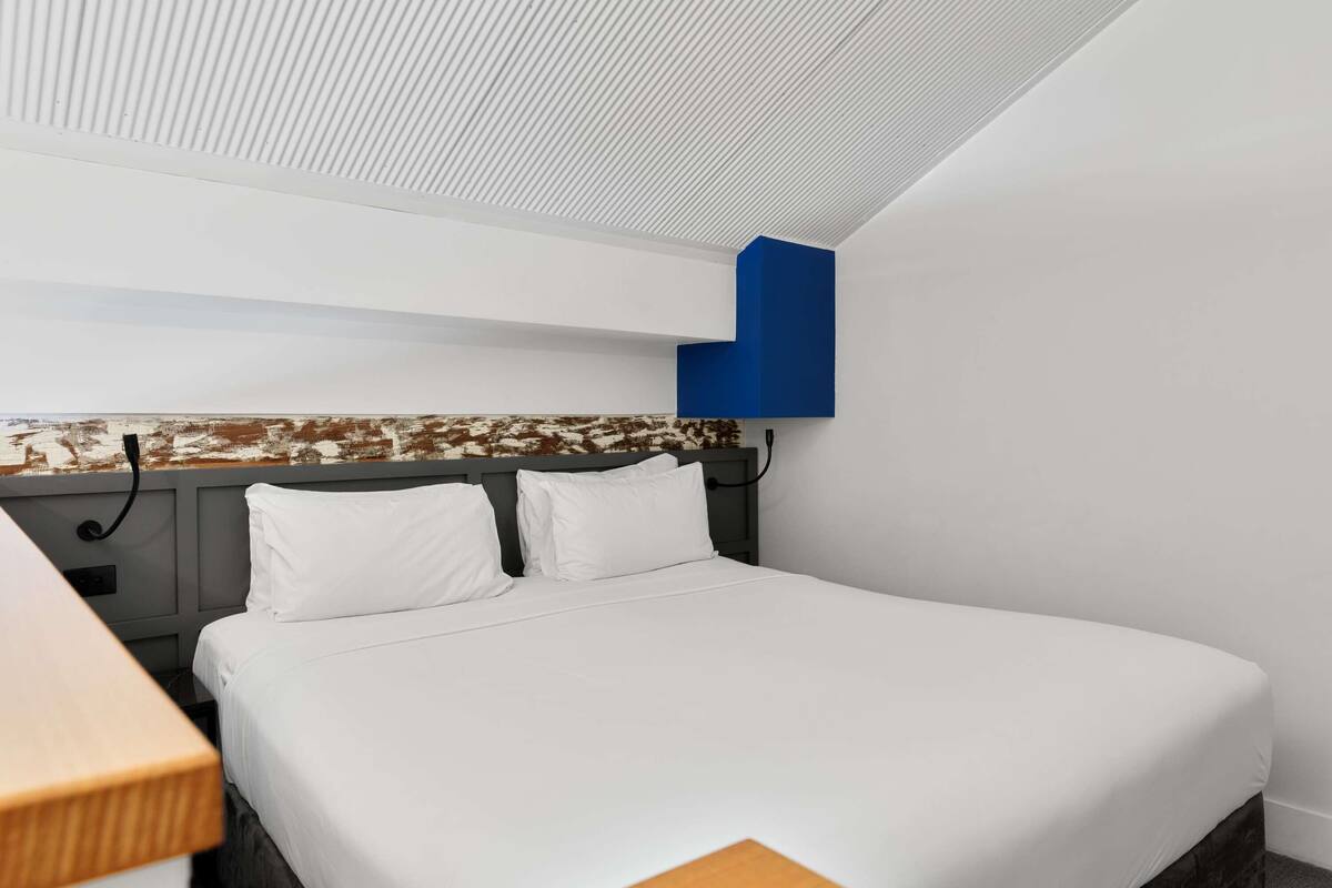 The Corriedale Loft with 1 King Bed | Premium bedding, in-room safe, desk, laptop workspace