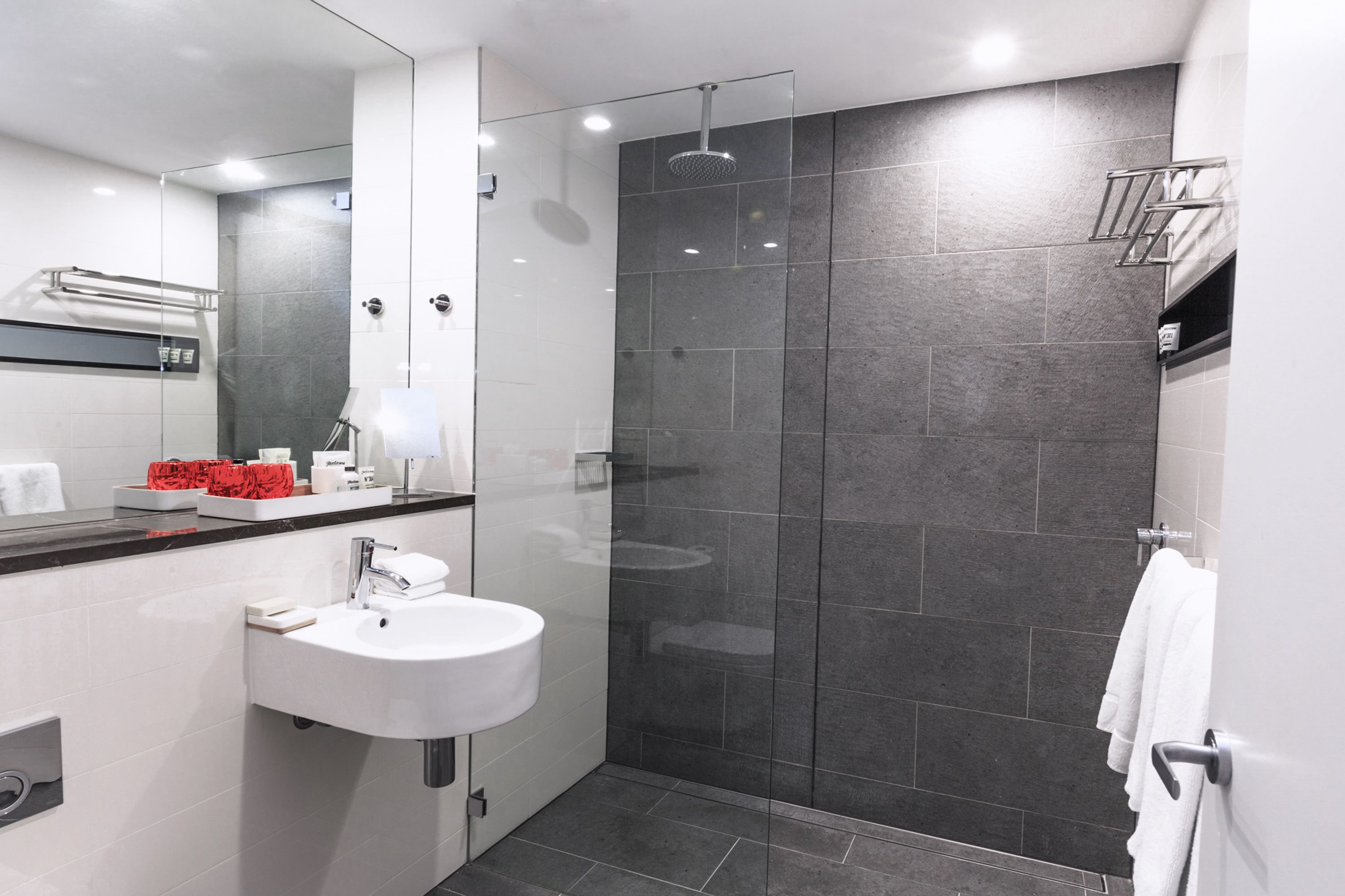 shower, rainfall showerhead, designer toiletries, hair dryer