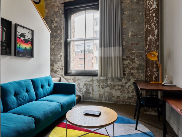 The Corriedale Loft with 1 King Bed | Living area | 32-inch LCD TV with digital channels