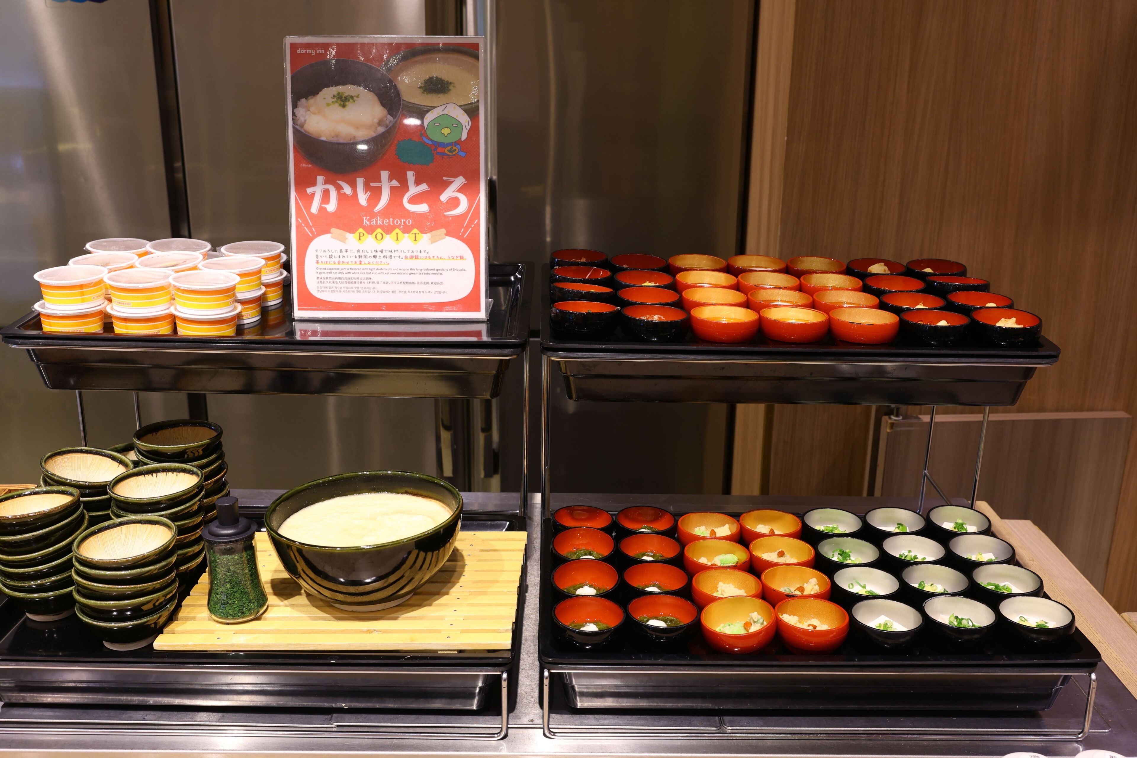 A buffet with various dishes and condiments.