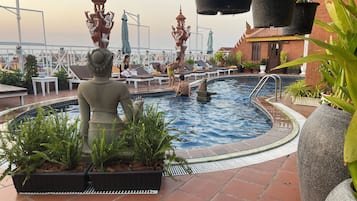 Indoor pool, outdoor pool, pool umbrellas, pool loungers