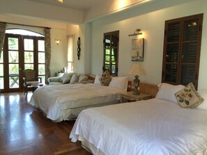 Deluxe Quadruple Room, 2 Double Beds, Garden View, Courtyard Area | Premium bedding, down duvets, minibar, individually decorated - Tuscany Resort (Hengchun)