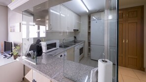 Standard Apartment, 1 Bedroom | Private kitchen | Fridge, microwave, stovetop, dishwasher