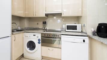 Standard Apartment, 1 Bedroom | Private kitchen | Fridge, microwave, stovetop, dishwasher