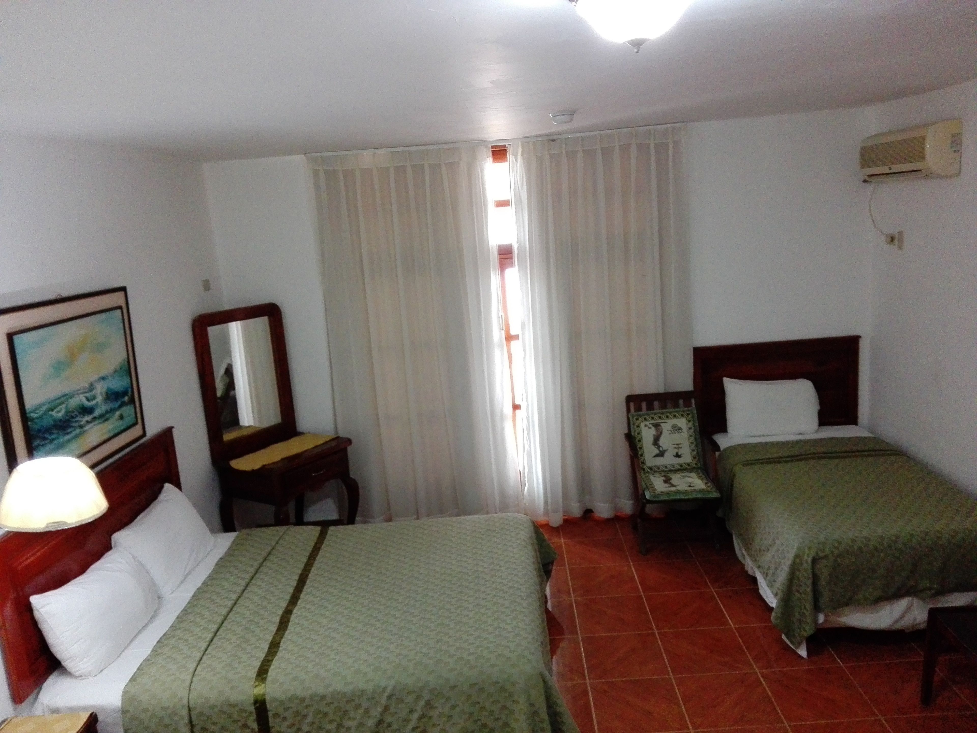 superior triple room, sea view (with air conditioner) | in-room safe, blackout curtains, cots/infant beds, rollaway beds