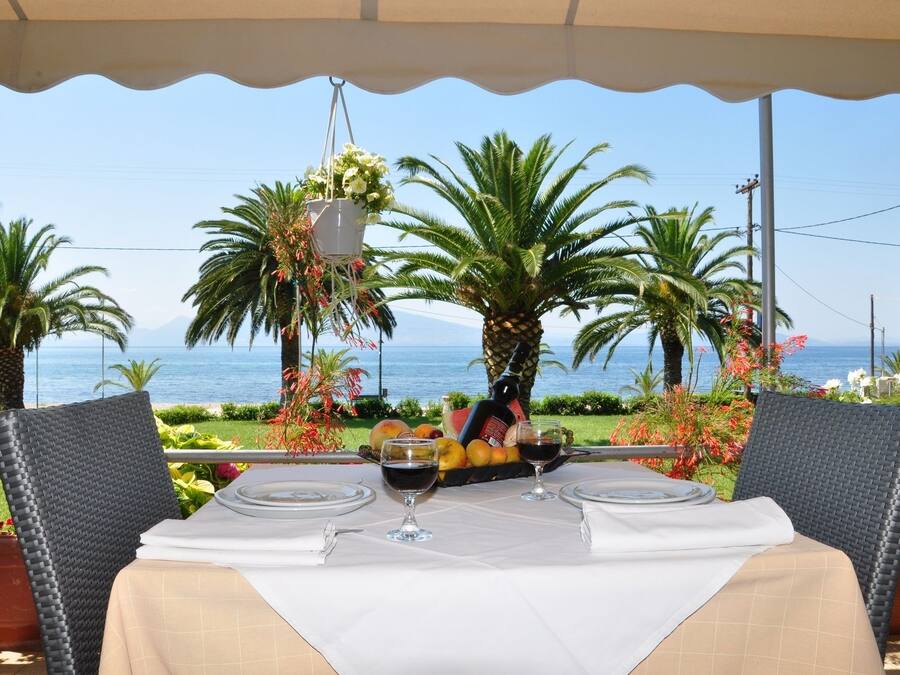 Breakfast, lunch, dinner served; Greek cuisine, beach views