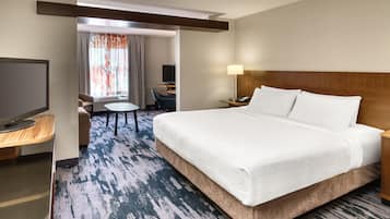 Desk, laptop workspace, blackout drapes, iron/ironing board