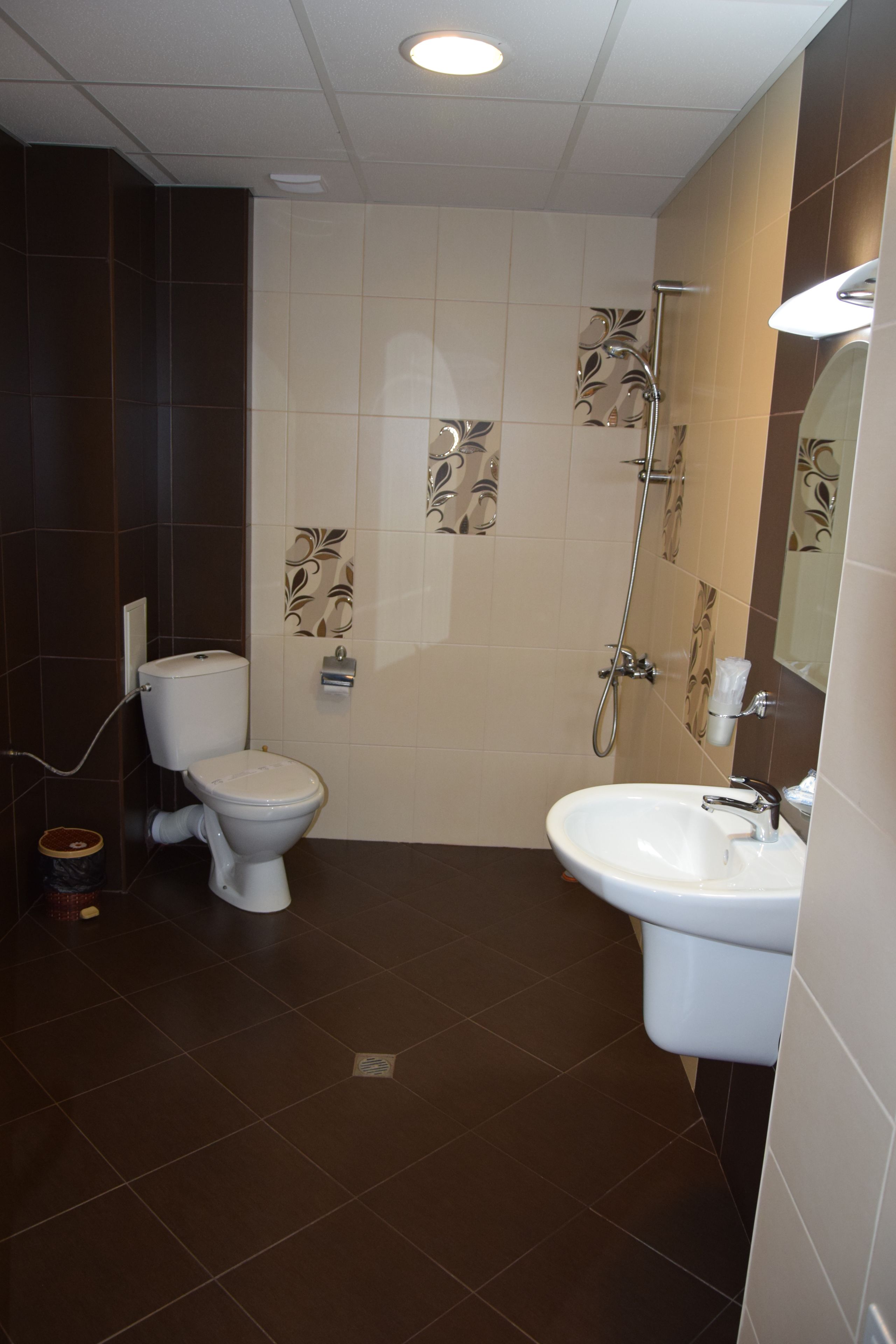 shower, free toiletries, slippers, towels