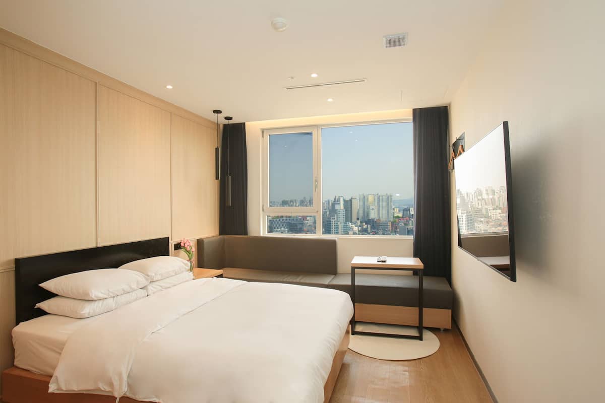 Deluxe Double Room | Memory foam beds, individually decorated, desk, blackout drapes