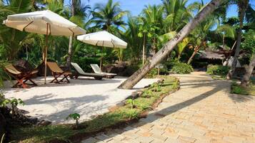 On the beach, beach shuttle, sun-loungers, beach towels