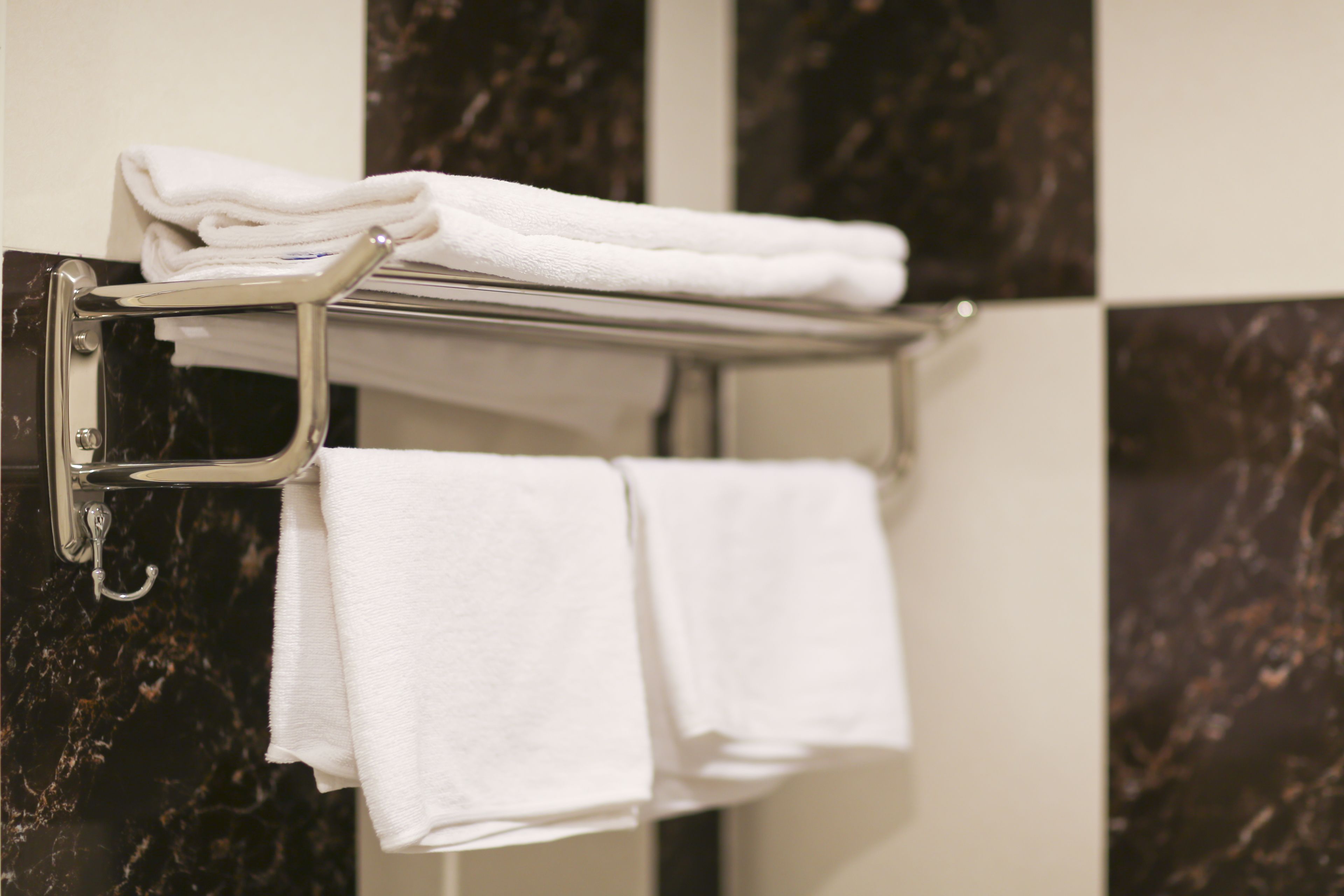 combined shower/bathtub, designer toiletries, hair dryer, bathrobes