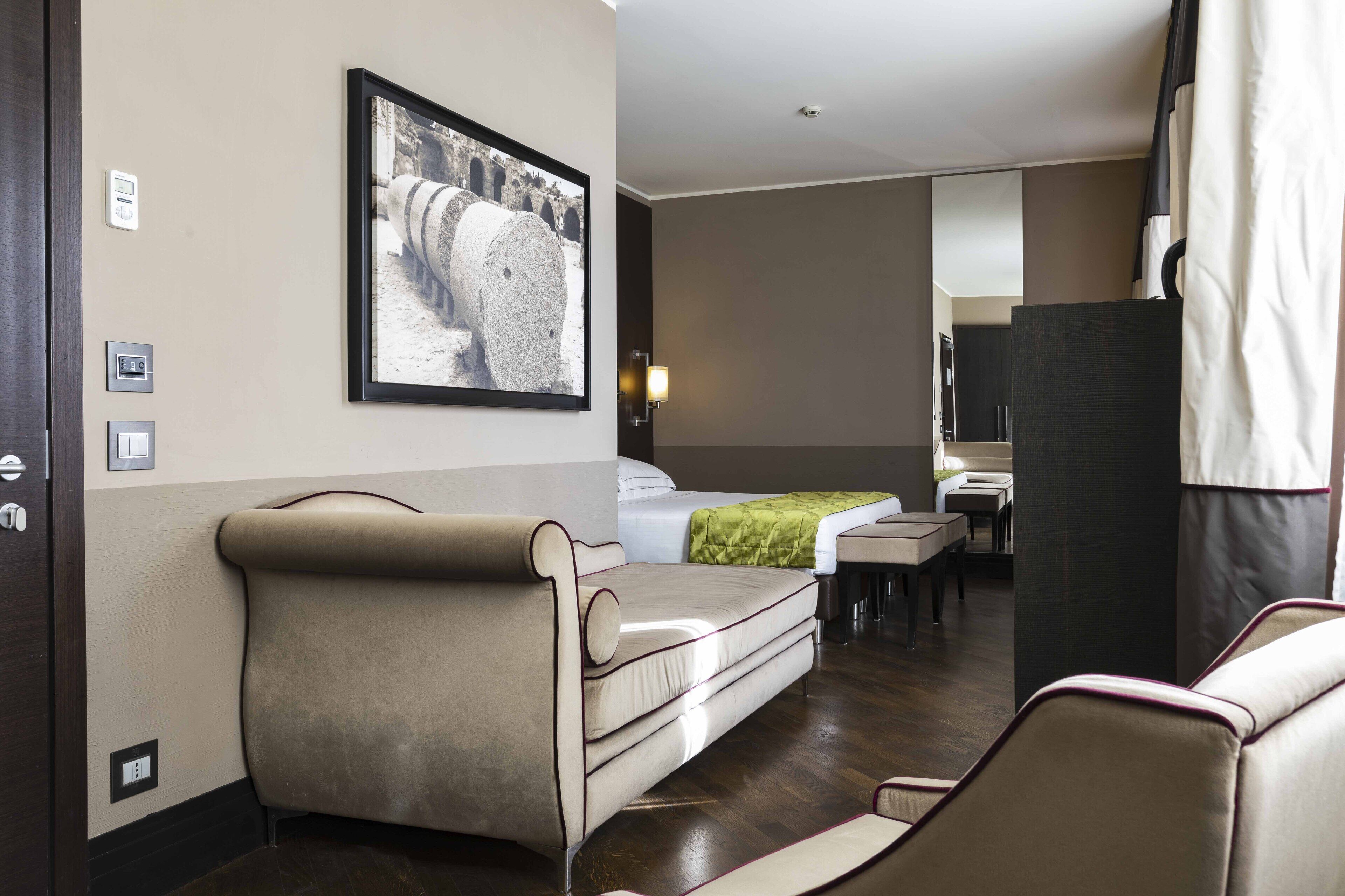 Habitación ejecutiva | Ropa de cama de alta calidad y caja de seguridad en la habitación 