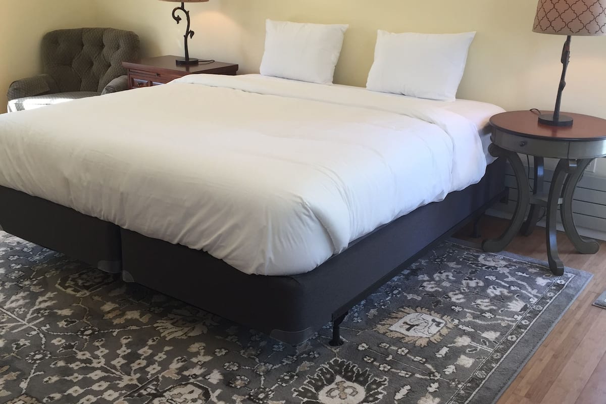 Premium bedding, down duvets, laptop workspace, blackout curtains