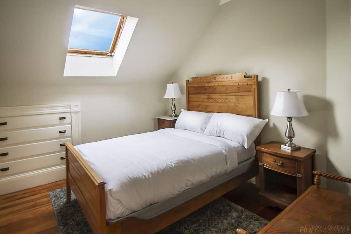 Premium bedding, down duvets, laptop workspace, blackout curtains
