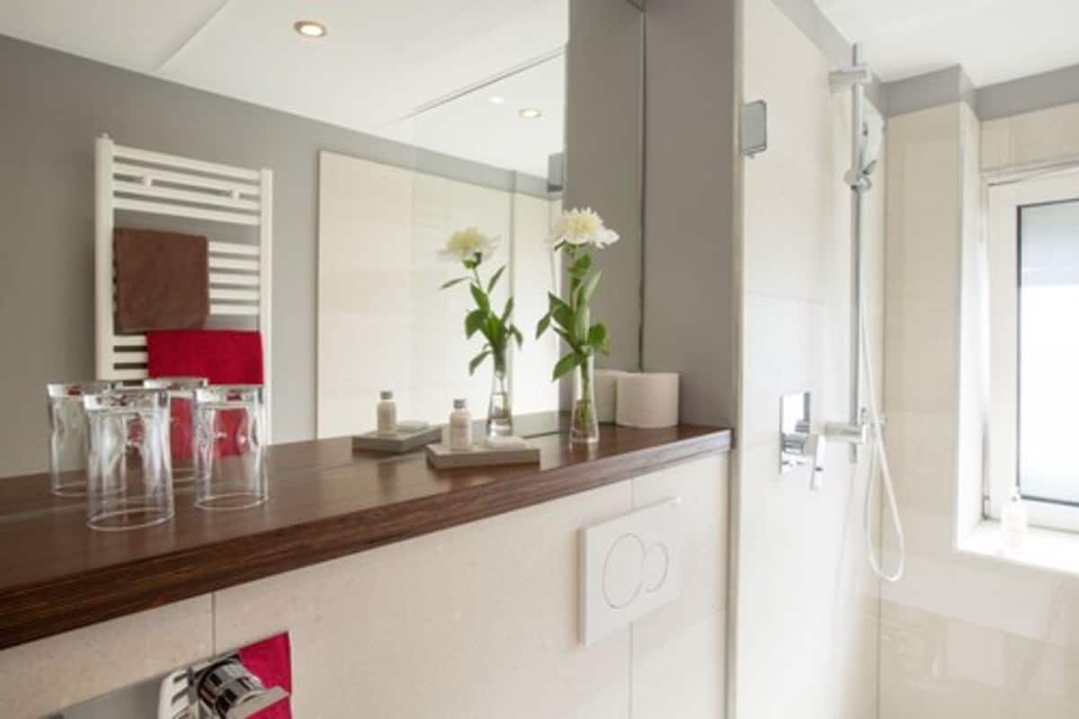family suite, 2 bedrooms | bathroom | deep-soaking bathtub, rainfall showerhead, free toiletries, hair dryer
