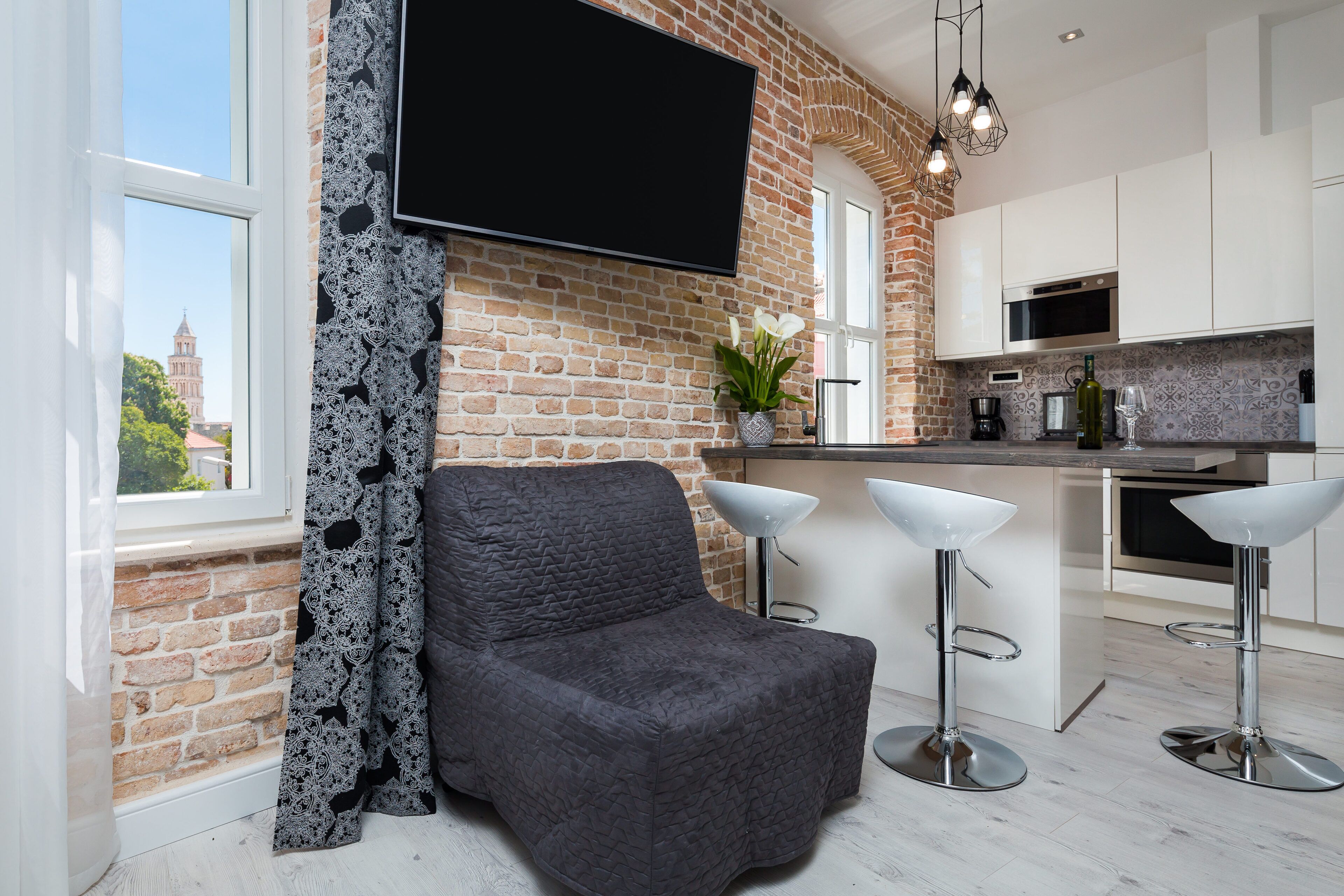 luxury studio suite  | living room | 55-inch lcd tv with cable channels, tv