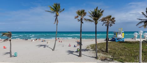 On the beach, sun-loungers, beach umbrellas, beach towels