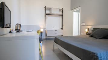 Habitación triple | Ropa de cama hipoalergénica, edredón y camas con efecto memoria