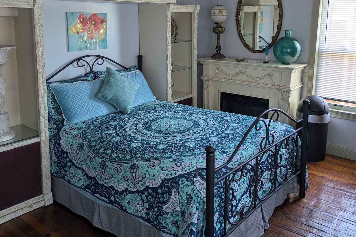 Olympus Room | Premium bedding, memory-foam beds, iron/ironing board, free WiFi