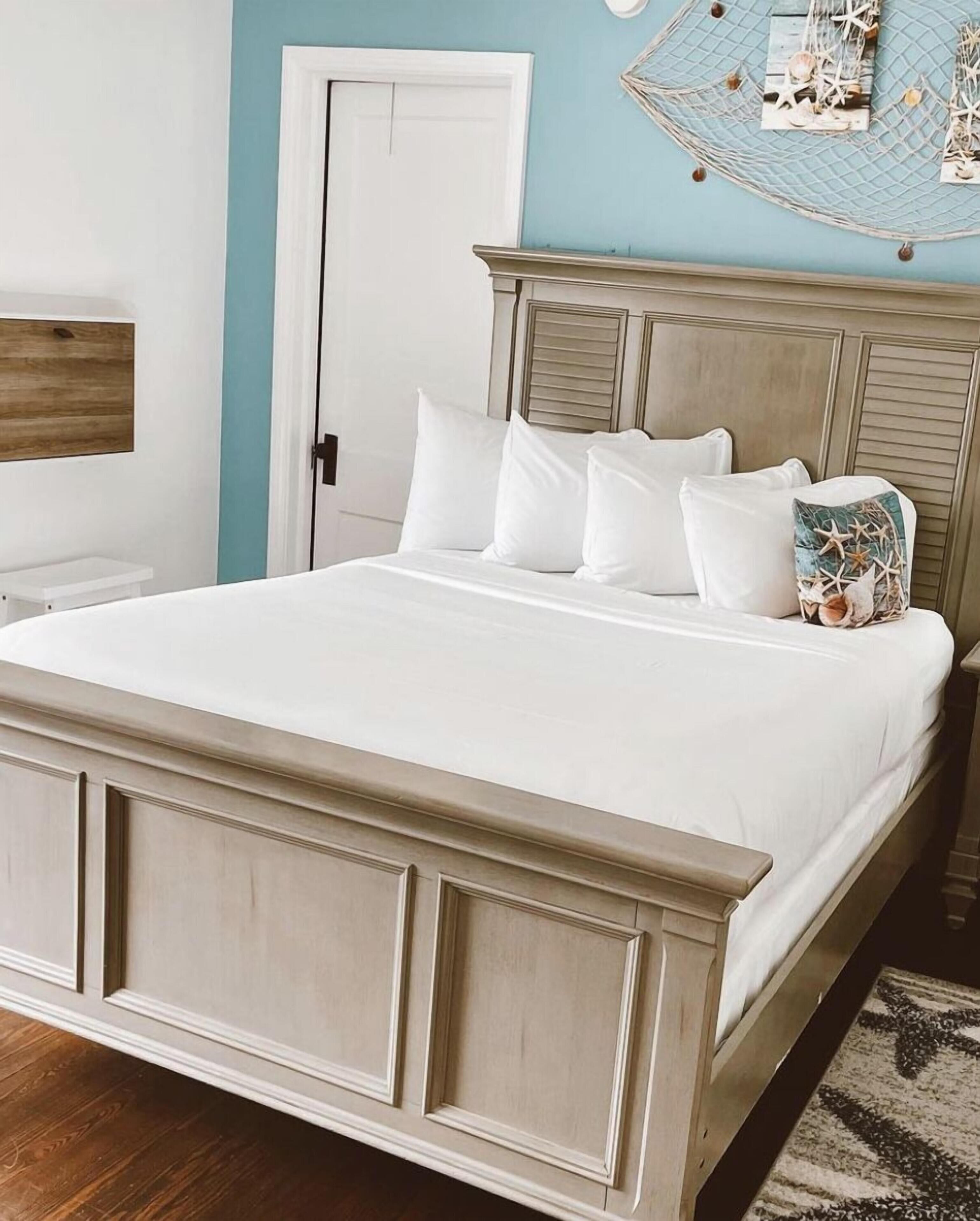 Premium bedding, down comforters, pillowtop beds, in-room safe