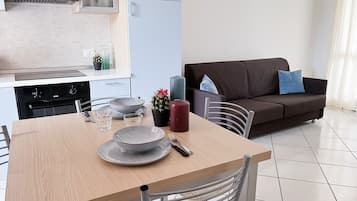 Apartment, 2 Bedrooms (On two floors) | Living area | 19-inch LCD TV with satellite channels, TV