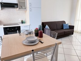 Apartment, 2 Bedrooms (On two floors) | Living area | 19-inch LCD TV with satellite channels, TV