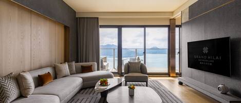 Deluxe Suite, Lake View | Living room | 45-inch LED TV with satellite channels, Netflix, streaming services