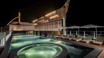 Outdoor pool, open 7:00 AM to 7:00 PM, pool umbrellas, sun loungers