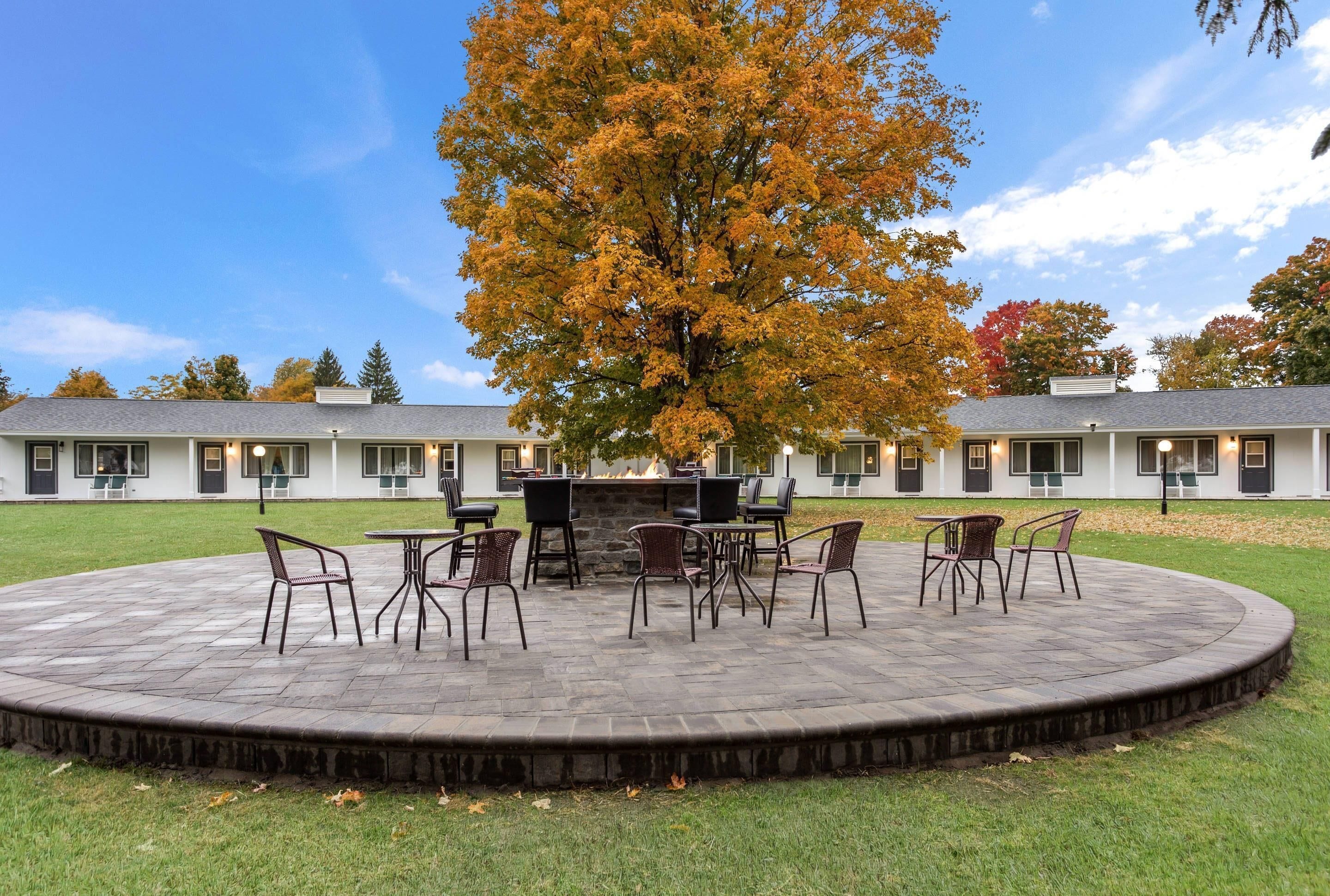 Indoor pool, seasonal outdoor pool, open 9 AM to 9 PM, pool umbrellas