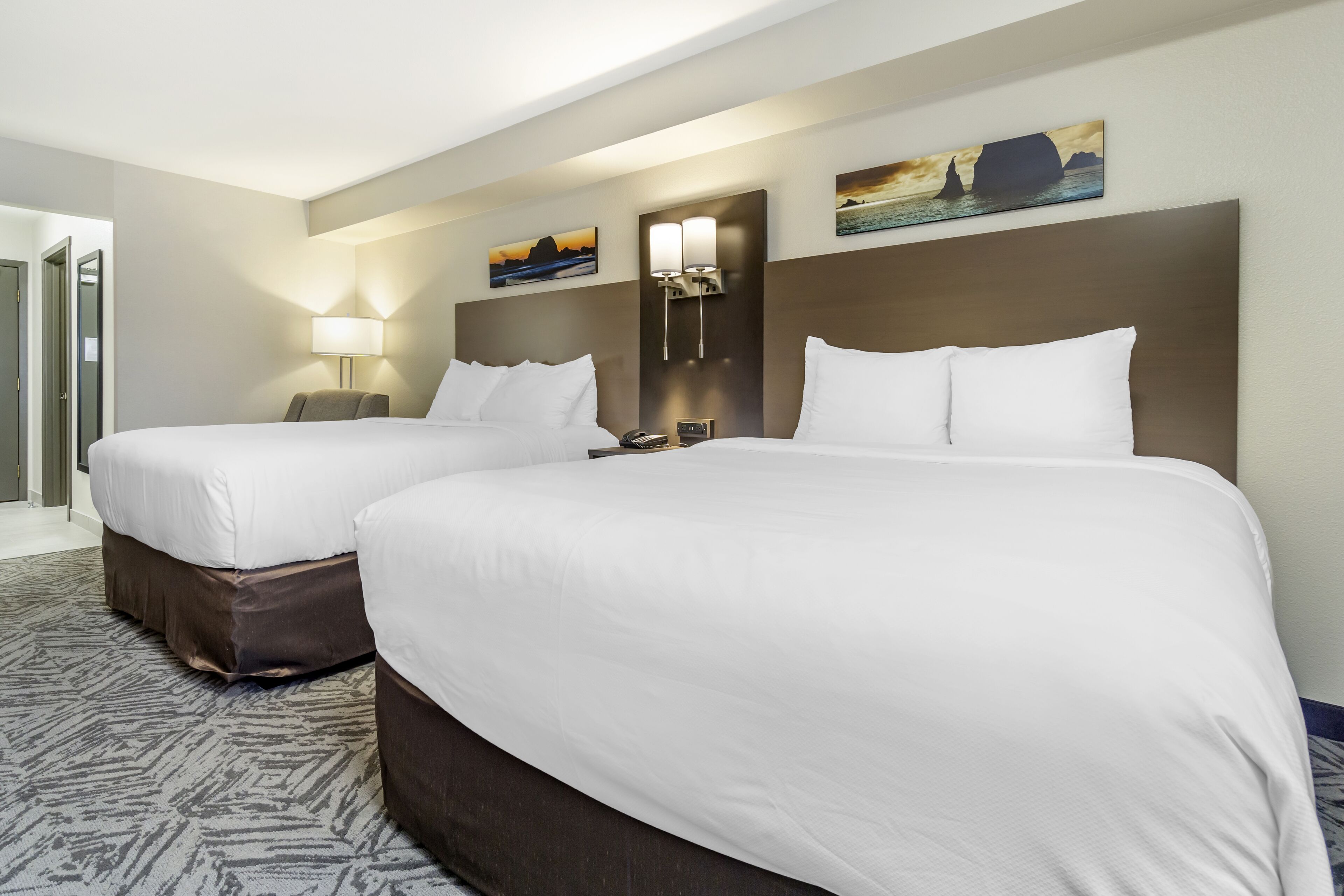 hypo-allergenic bedding, pillow-top beds, desk, laptop workspace