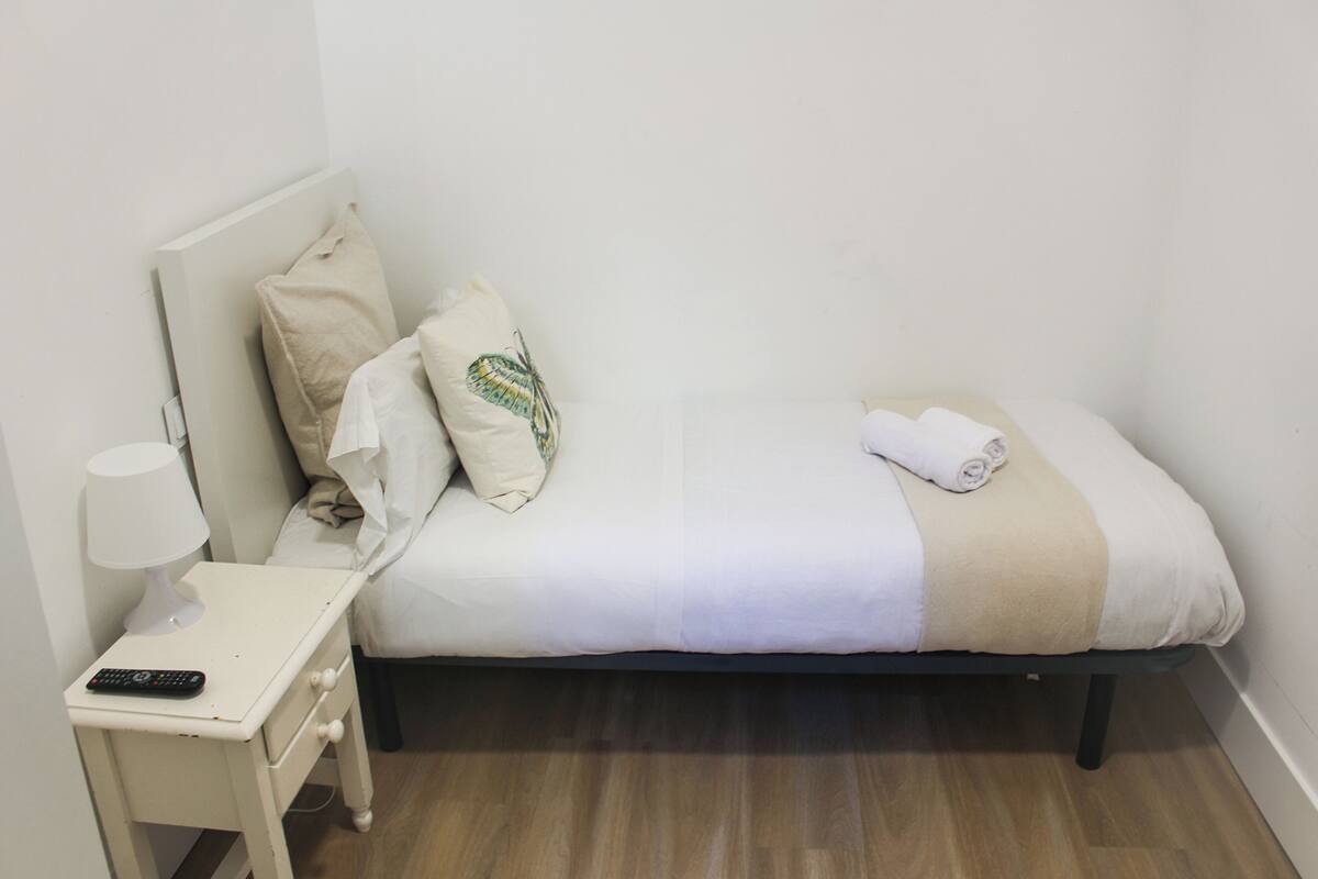 Down comforters, desk, blackout drapes, iron/ironing board (on request)