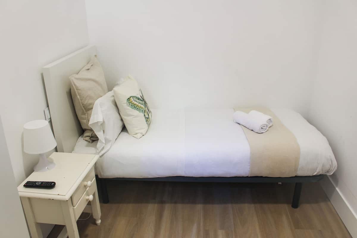 Down comforters, desk, blackout drapes, iron/ironing board (on request)