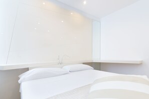 Suite Deluxe | Roba de llit d'alta qualitat, minibar i caixa forta a l'habitació 