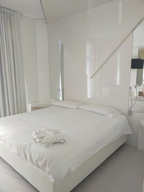 Ropa de cama de alta calidad y minibar 