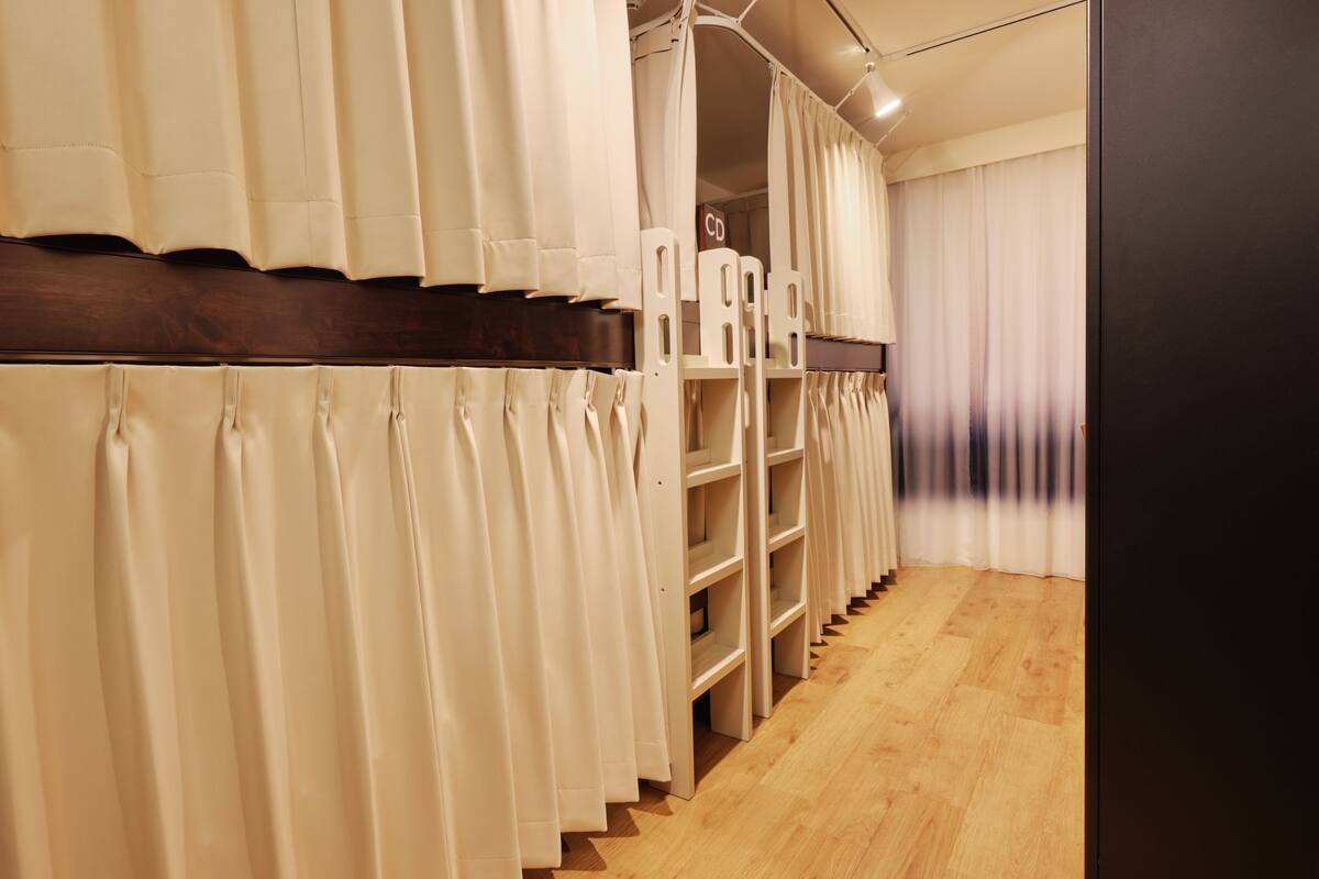 Desk, blackout drapes, soundproofing, iron/ironing board (on request)
