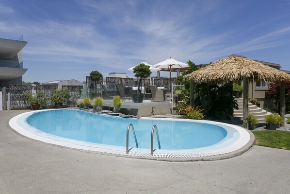 Outdoor pool, open 7:30 AM to 9:30 AM, pool umbrellas, sun loungers